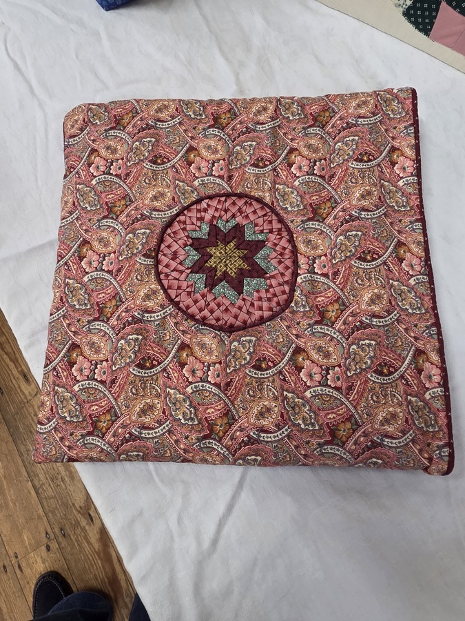 Caroline - a quillo that unfolds to be a quilt and refolds to be a pillow - ingenious